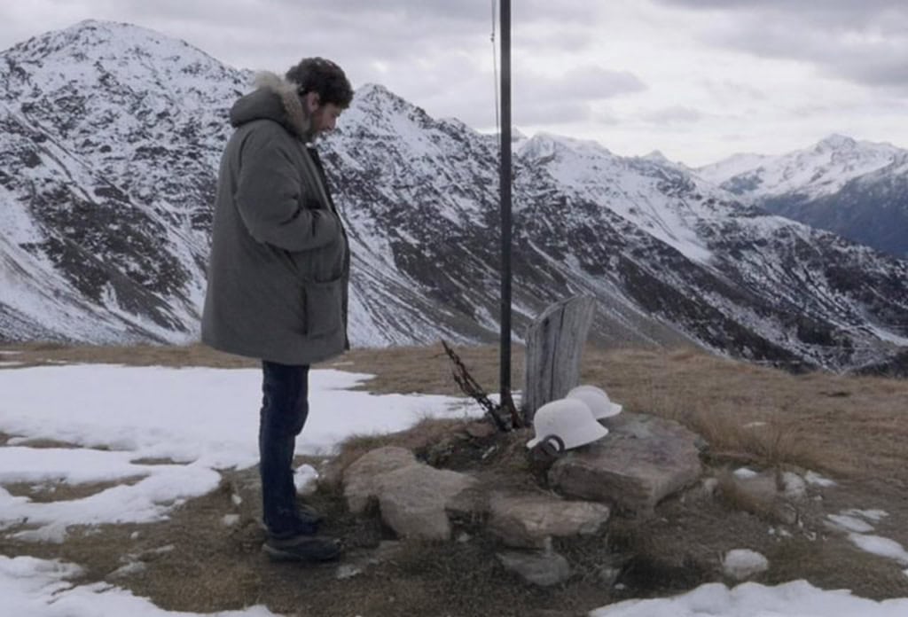 Massimo Reale in montagna con neve e roccia